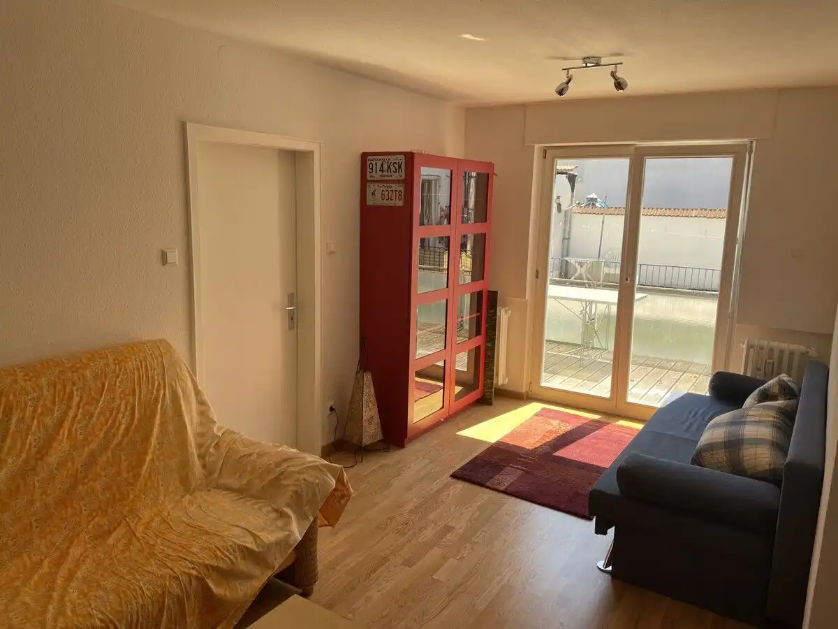 OG Wohnzimmer mit Ausgang zum Balkon