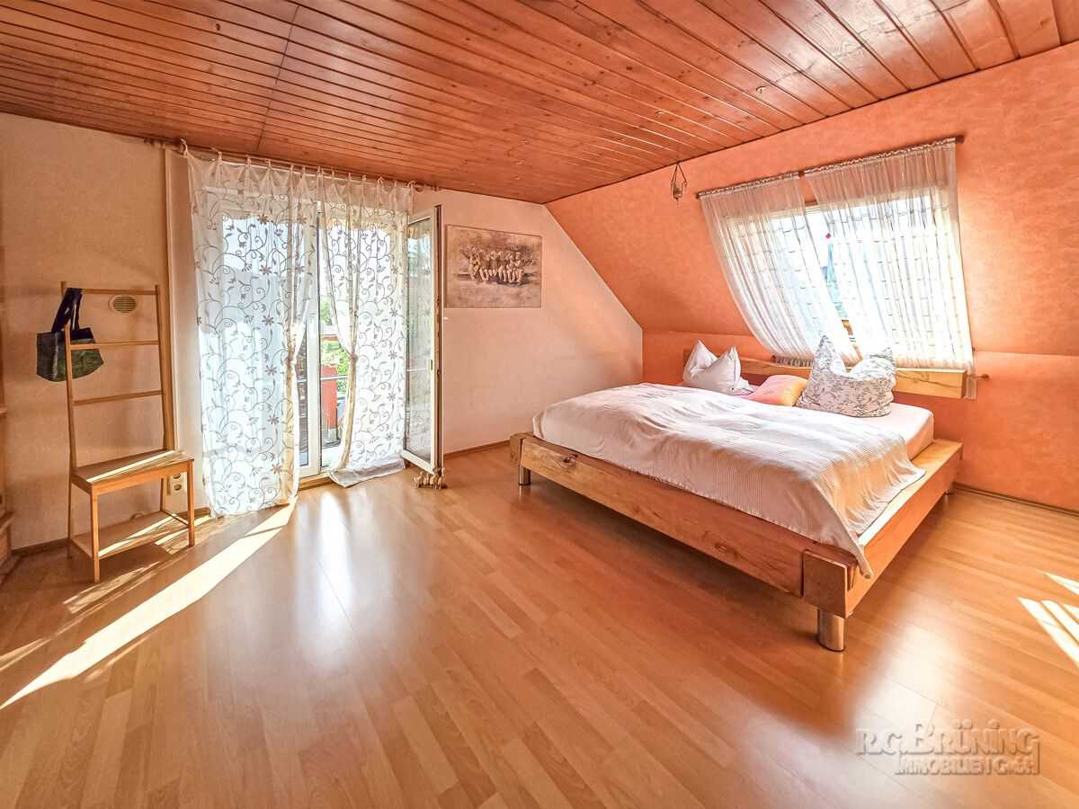 Schlafzimmer mit Balkon